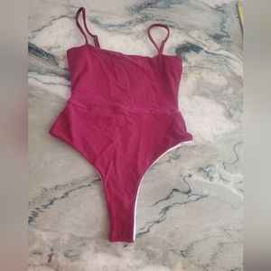 Cheeky one piece bathing suit.